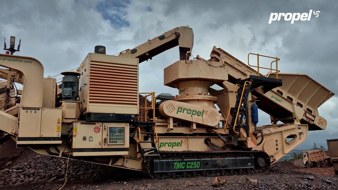 Propel track-mounted crushing equipment at a mining site